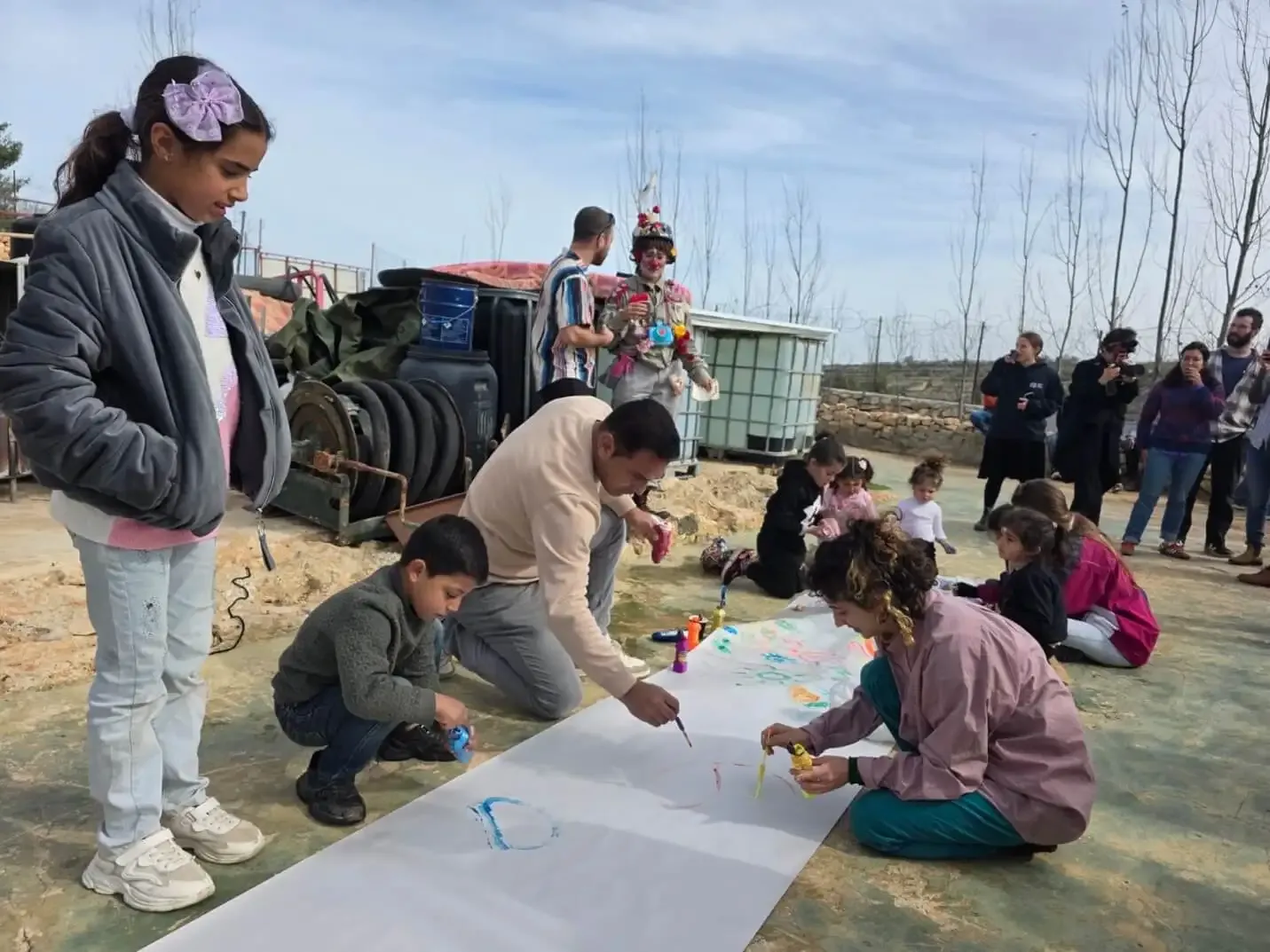 Children painting and creating together
