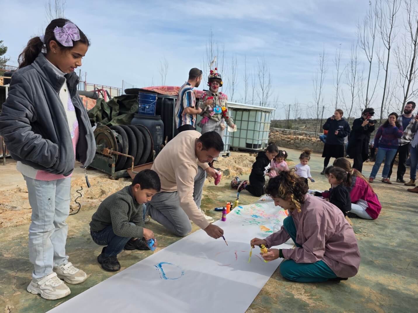 Children painting and creating together